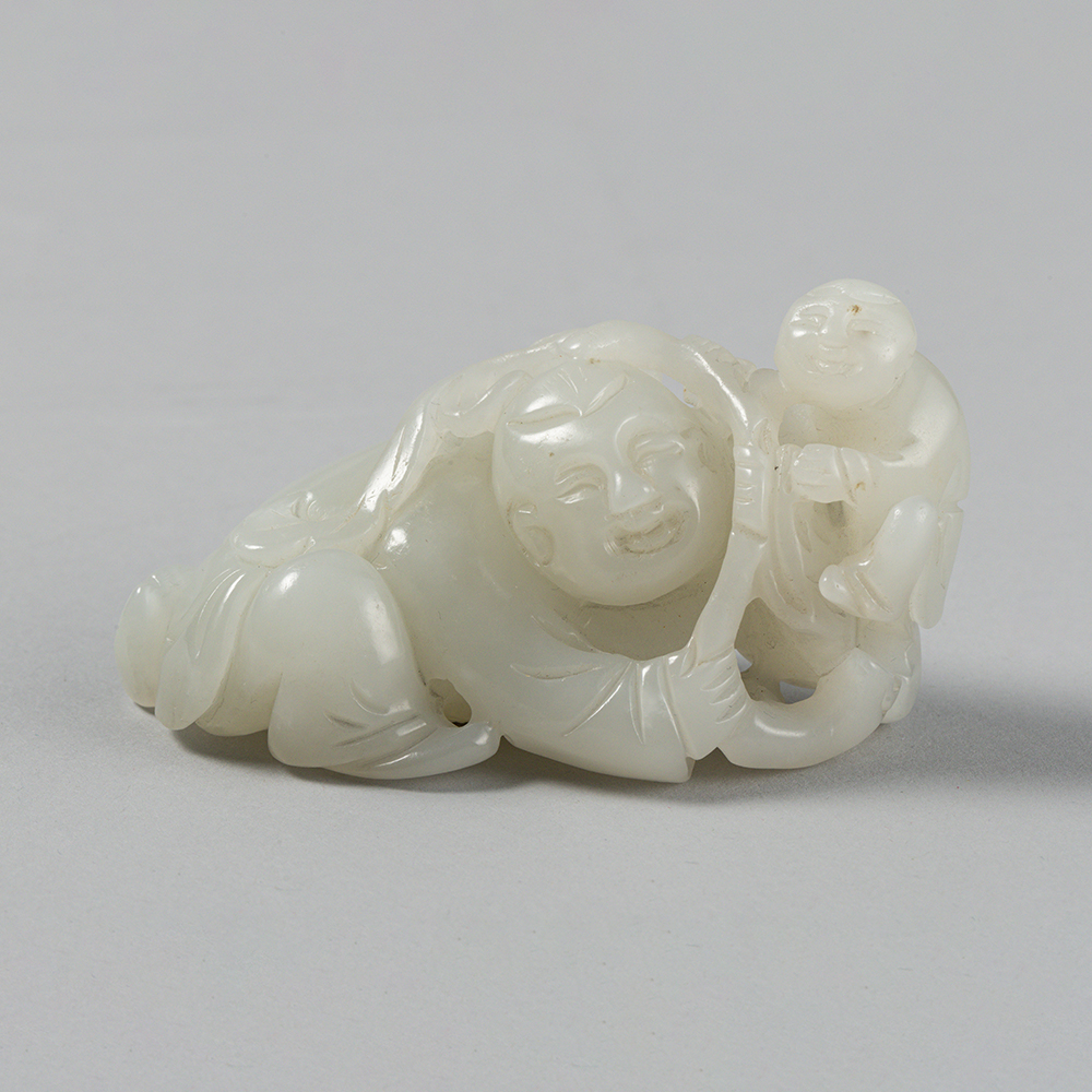 Lot2003 A celadon jade 'children' carving Qing dynasty