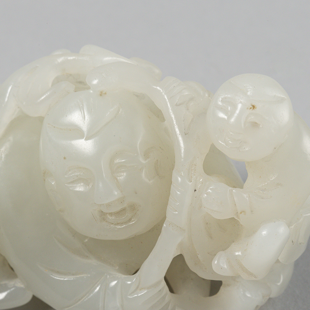 Lot2003 A celadon jade 'children' carving Qing dynasty