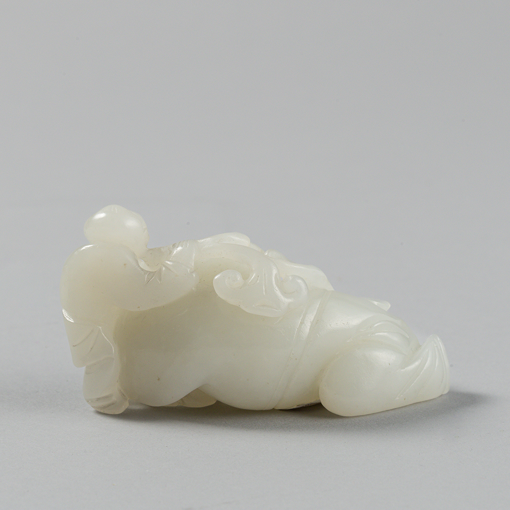 Lot2003 A celadon jade 'children' carving Qing dynasty