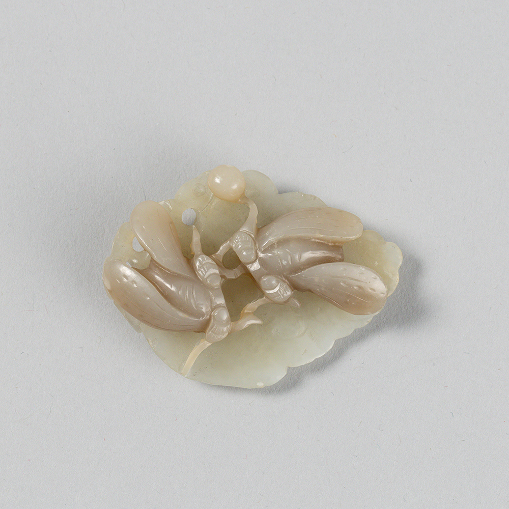 Lot2007 WHITE AND PALE BROWN JADE ‘CICADAS ON LEAF PENDANT Qing Dynasty (18th – 19th)