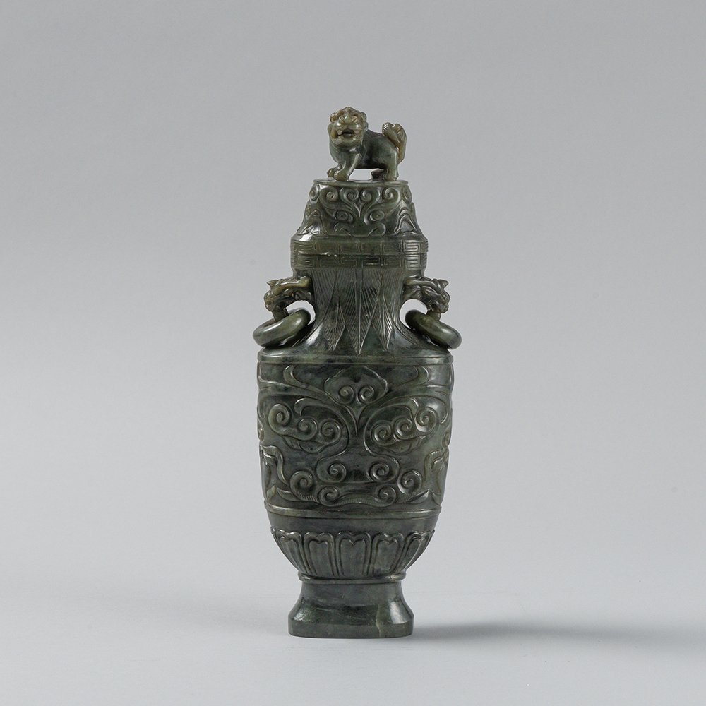 Lot2008 AN ARCHAISTIC SPINACH-GREEN JADE VASE AND COVER Late Qing to Republic (19세기말-20세기초)