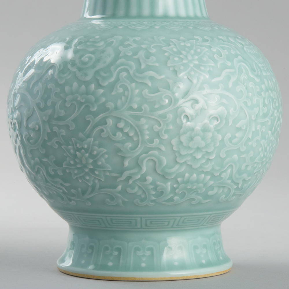 Lot1042 QING DOUQING GLAZE CARVED PORCELAIN BENBA POT Qianlong six-character mark, but later (20th century)