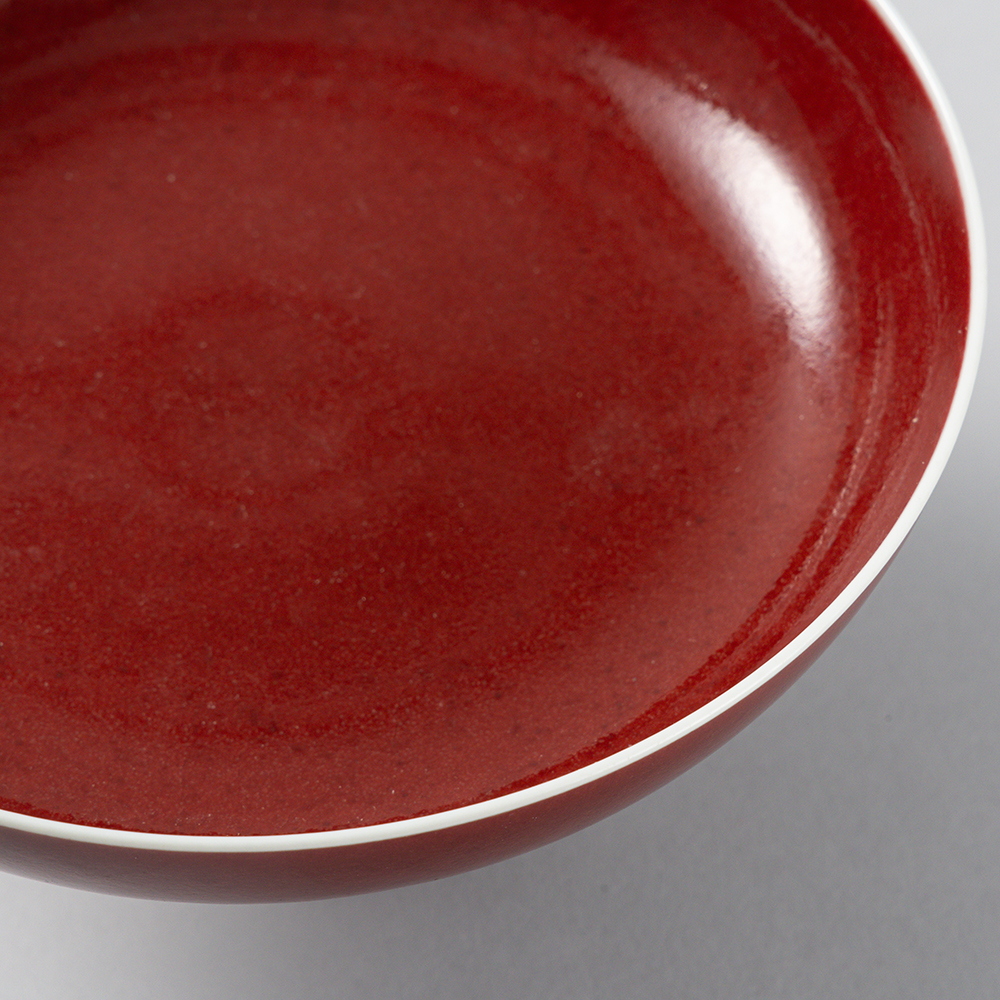 Lot1057 A COWPEA-RED GLAZED PORCELAIN PLATE  (QIANLONG PERIOD 1736-1795)